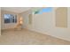 Spacious bedroom features a large window and decorative accents for a bright and inviting atmosphere at 6442 Tailfeather Way, Bradenton, FL 34203