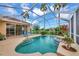 Beautiful private screened pool with spa and lush landscaping, great for outdoor fun at 6442 Tailfeather Way, Bradenton, FL 34203