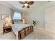 Airy bedroom featuring side tables and a decor plant at 7913 Osprey Hammock Ct, Sarasota, FL 34240