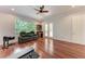 Bonus room with hardwood floors is a great space for exercise or relaxation at 7913 Osprey Hammock Ct, Sarasota, FL 34240