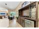 Kitchen/Dining room area featuring a wine rack and beverage fridge at 7913 Osprey Hammock Ct, Sarasota, FL 34240