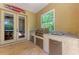 Outdoor kitchen featuring a grill, cabinets, and granite countertop at 7913 Osprey Hammock Ct, Sarasota, FL 34240