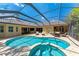 Private pool with a screened enclosure, offering a refreshing outdoor oasis at 7913 Osprey Hammock Ct, Sarasota, FL 34240