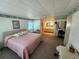 Spacious bedroom featuring a closet, an ensuite bathroom, and a desk area at 808 53Rd E Ave # 234, Bradenton, FL 34203