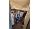 A well-organized closet featuring clothing racks, shelving, and storage for shoes and linens at 808 53Rd E Ave # 234, Bradenton, FL 34203