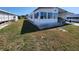 A pleasant single-story residence displaying a well-kept lawn and neutral color scheme that blends with the surrounding landscape at 808 53Rd E Ave # 234, Bradenton, FL 34203
