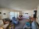 Inviting living room showcasing cozy seating, soft lighting, and a soothing color palette, creating a welcoming atmosphere at 808 53Rd E Ave # 234, Bradenton, FL 34203