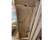 Standing shower unit featuring sliding glass doors, and chrome fixtures at 808 53Rd E Ave # 234, Bradenton, FL 34203