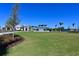 Expansive community amenity lawn for recreation, leisure, or community events; a vibrant outdoor space at 8722 Backshore Ln, Parrish, FL 34219