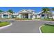 Elegant clubhouse with manicured landscaping and convenient circular drive at 8722 Backshore Ln, Parrish, FL 34219