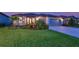 Beautiful single-story home with a well-maintained lawn and two-car garage at 8722 Backshore Ln, Parrish, FL 34219