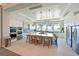 Beautiful kitchen with an oversized island, stainless steel appliances, and pendant lighting at 8722 Backshore Ln, Parrish, FL 34219