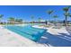 Sparkling pool offers clear water, a dedicated swim lane, and lounge chairs for relaxation under the sun at 8722 Backshore Ln, Parrish, FL 34219