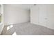 This bedroom features carpeted floors and a bright, airy atmosphere at 9035 Duany Ln, Lakewood Ranch, FL 34240