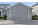 Attached one car garage door on a well maintained single Gathering home with lovely curb appeal at 9035 Duany Ln, Lakewood Ranch, FL 34240
