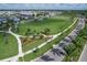 Expansive green community park offers space for leisure, relaxation and recreation in a beautifully landscaped environment at 10217 Canaveral Cir, Sarasota, FL 34241