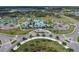 Stunning community clubhouse boasts a luxurious pool, tennis courts and many other resort-style amenities at 10217 Canaveral Cir, Sarasota, FL 34241
