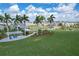 Serene community green space perfect for picnics and gatherings, enhancing the neighborhood's charm at 10217 Canaveral Cir, Sarasota, FL 34241