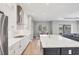 Spacious, modern kitchen with stainless steel appliances, a large island, and an open floor plan at 10217 Canaveral Cir, Sarasota, FL 34241