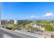 Enjoy the panoramic view of the community, golf course, nearby beaches, and ocean at 1050 Longboat Club Road # 903, Longboat Key, FL 34228