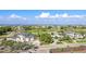 Enjoy the view of the community, golf course, tennis courts, nearby beaches, and ocean at 1050 Longboat Club Road # 903, Longboat Key, FL 34228