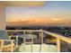 Balcony seating with beautiful views of city and Gulf sunset at 1050 Longboat Club Road # 903, Longboat Key, FL 34228