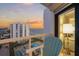 Balcony boasts ocean views and a comfortable seating area at 1050 Longboat Club Road # 903, Longboat Key, FL 34228