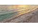 Enjoy the golden hour on the ocean and sandy beach at 1050 Longboat Club Road # 903, Longboat Key, FL 34228