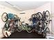 Secured bike storage room with multiple racks for organizing and storing resident bicycles at 1050 Longboat Club Road # 903, Longboat Key, FL 34228