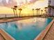 Enjoy a refreshing swim in the beachfront pool with ample seating and beautiful ocean views at 1050 Longboat Club Road # 903, Longboat Key, FL 34228