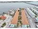 Aerial view of complex near waterfront, bridge and city at 117 7Th N St # 5, Bradenton Beach, FL 34217
