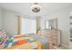 Comfortable bedroom with ceiling fan and charming decor at 117 7Th N St # 5, Bradenton Beach, FL 34217