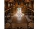 Large event space with a central chandelier and dance floor, perfect for gatherings and celebrations at 12615 River Rd, Myakka City, FL 34251