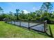 Large outdoor garden with a wooden fence, ready for planting and cultivating at 12615 River Rd, Myakka City, FL 34251