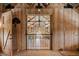 Interior view showcasing wooden architecture and a glimpse into another level with unique design at 12615 River Rd, Myakka City, FL 34251