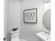 Bright half bath with modern fixtures and stylish decor at 13902 Messina Loop, Bradenton, FL 34211