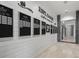 Image shows a hallway with multiple community awards and golf course achievements posted on the wall at 13902 Messina Loop, Bradenton, FL 34211