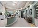 A reception area features a countertop, seating and various retail displays at 13902 Messina Loop, Bradenton, FL 34211