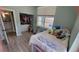 Cozy bedroom with an open closet and plenty of natural light at 1609 17Th W St, Bradenton, FL 34205