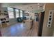 Charming kitchen featuring a large island with granite countertops and an adjacent seating area filled with natural light at 1609 17Th W St, Bradenton, FL 34205