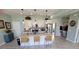 Bright kitchen with granite countertops, modern stainless steel appliances, and a functional island with bar seating at 1609 17Th W St, Bradenton, FL 34205