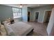 Serene main bedroom features ample space, a large window, and an ensuite bathroom for added privacy at 1609 17Th W St, Bradenton, FL 34205