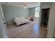 Serene main bedroom features ample space, a large window, and a walk-in closet for added storage at 1609 17Th W St, Bradenton, FL 34205