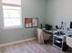 Comfortable office with a large window, desk space and storage at 1609 17Th W St, Bradenton, FL 34205