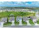 Wide aerial view of a residential community, highlighting the home's location and neighborhood layout at 17669 Cantarina Cv, Bradenton, FL 34211