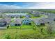 Aerial view of the neighborhood showcasing houses and green lawns at 17669 Cantarina Cv, Bradenton, FL 34211