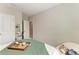 Bedroom featuring a queen bed, carpeted floors, and neutral paint at 17669 Cantarina Cv, Bradenton, FL 34211