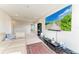 Spacious loft area with comfortable seating, media center, and easy access to other rooms at 17669 Cantarina Cv, Bradenton, FL 34211