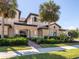 Stunning condo with lush landscaping and mature palm trees at 23572 Awabuki Dr # 202, Venice, FL 34293