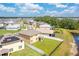 Aerial view showcases a home with a spacious backyard in a quiet neighborhood setting at 259 Tierra Verde Way, Bradenton, FL 34212